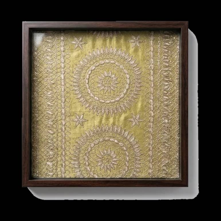 Olive-gold Banaras zari floors this ebony serving tray.