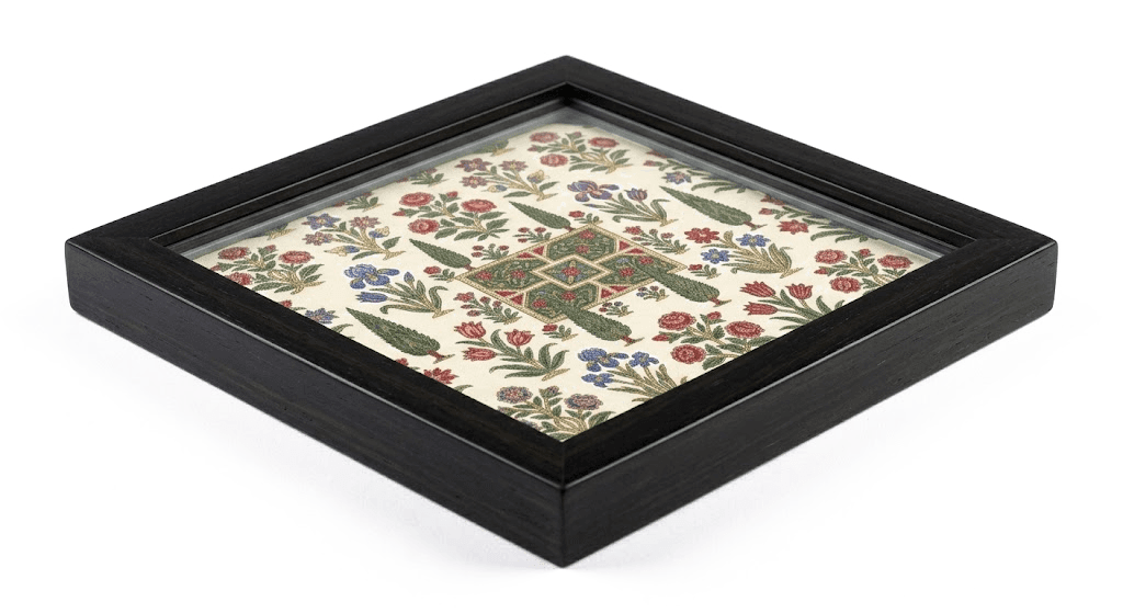 Five-inch coasters in solid wood and glass, each cut from a panel of hand-woven silk.