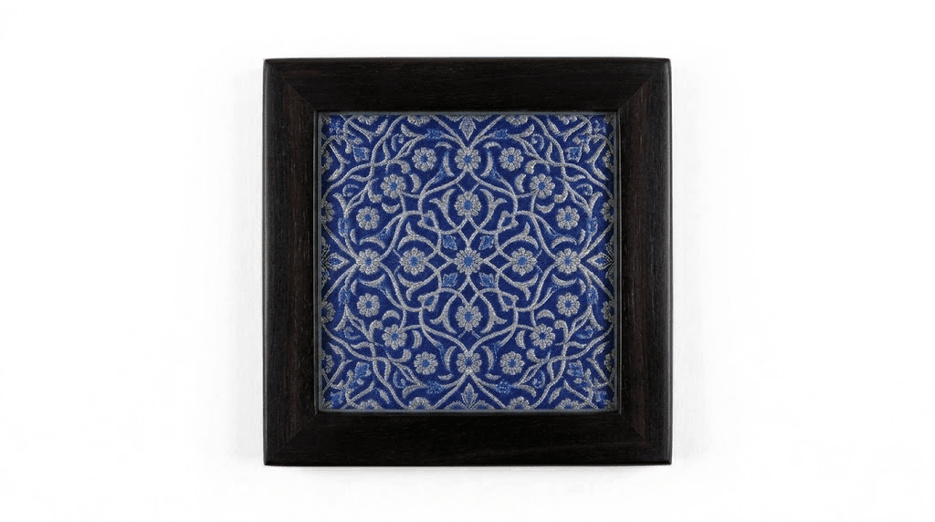 Neelam — A quieter weave — the colour of evening, with sparse silver-gold motifs.